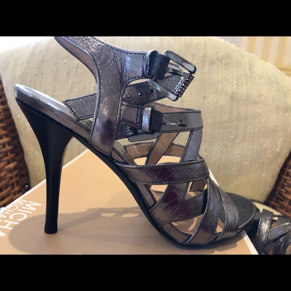 Gun metal metallic Michael Kors strappy heels.